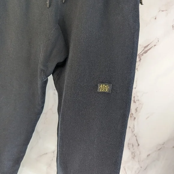 Advisory Board Crystals Sweatpants Mens XL Black ABC 123 Revolve Los Angeles